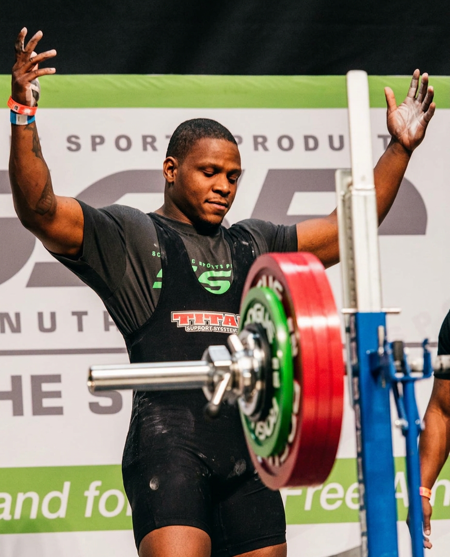 Dexter Jones completing a heavy squat in competition